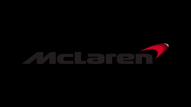 McLaren logo featuring a stylized orange swoosh